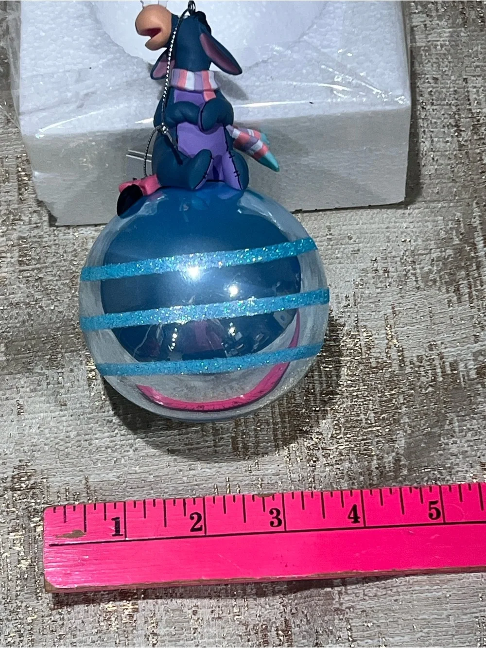 Disney eeyore perched